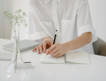 Women writing in a journal