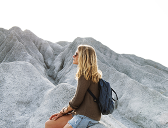 Blond women on a rock