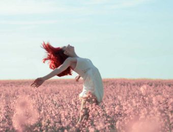 Girl in pink field